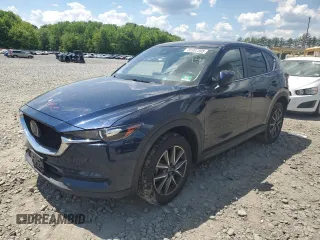 2018 Mazda CX-5 Touring with VIN JM3KFBCMXJ0460020, listed as a Copart auction lot 55997305 with 56,361 mi miles and Salvage Title. Bid and sale history available at DreamBid. Image 1.