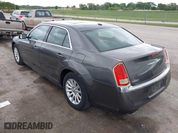 2013 Chrysler 300 with VIN 2C3CCAAG9DH707447, listed as a IAAI auction lot 42292077 with 171,329 mi miles and . Bid and sale history available at DreamBid. Image 3.