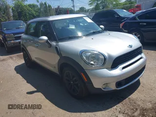 2013 MINI Countryman S ALL4 z VIN WMWZC5C53DWP32884, wystawiony jako IAAI lot #42818372 z przebiegiem 77 357 mil mil oraz . Historia ofert i sprzedaży dostępna na DreamBid. Obrazek 1.