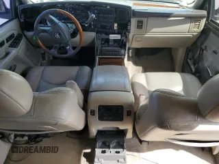 2004 Cadillac Escalade z VIN 1GYEC63T44R235759, wystawiony jako Copart lot #53166755 z przebiegiem 212 034 mil mil oraz Szkody całkowita. Historia ofert i sprzedaży dostępna na DreamBid. Obrazek 8.