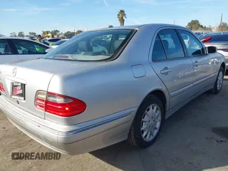 2002 Mercedes-Benz E-Class with VIN WDBJF65J72B485024, listed as a IAAI auction lot 41433088 with 100,100 mi miles. Bid and sale history available at carsss.com. Image 4.