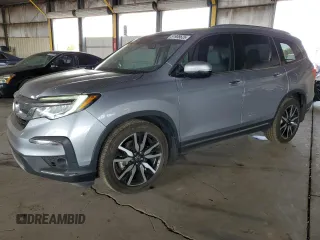 2019 Honda Pilot Touring 7-Passenger z VIN 5FNYF5H6XKB020056, wystawiony jako Copart lot #51908625 z przebiegiem 94 718 mil mil oraz Szkoda całkowita • Salvage title. Historia ofert i sprzedaży dostępna na DreamBid. Obrazek 1.