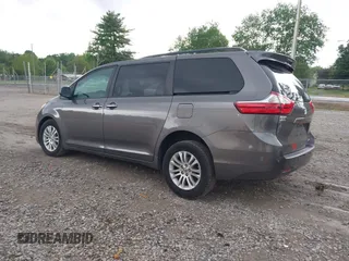 2016 Toyota Sienna XLE with VIN 5TDYK3DC8GS721290, listed as a IAAI auction lot 42127035 with 142,150 mi miles and . Bid and sale history available at DreamBid. Image 3.