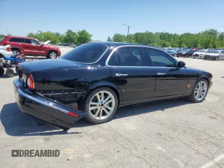 2004 Jaguar XJ с VIN SAJEA73B34TG10749, выставлен на аукционе Copart как лот 56574025 с пробегом 72 240 миль миль и Списание • Salvage title. История ставок и продаж доступна на DreamBid. Изображение 3.