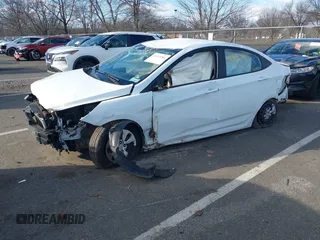 2015 Hyundai Accent GLS with VIN KMHCT4AE0FU926952, listed as a IAAI auction lot 41225280 with 51,148 mi miles and . Bid and sale history available at DreamBid. Image 2.