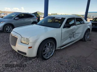 2006 Chrysler 300 with VIN 2C3KA43R56H363006, listed as a Copart auction lot 65469944 with 133,641 mi miles and Salvage Title. Bid and sale history available at carsss.com. Image 1.