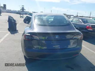 2022 Tesla Model 3 with VIN 5YJ3E1EA1NF142713, listed as a IAAI auction lot 42027630 with 112,557 mi miles. Bid and sale history available at carsss.com. Image 15.