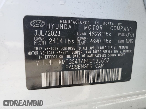 2023 Genesis G70 2.0T with VIN KMTG34TA8PU131652, listed as a Copart auction lot 48738254 with 9,713 mi miles and Non Repairable. Bid and sale history available at DreamBid. Image 13.
