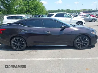 2016 Nissan Maxima SL with VIN 1N4AA6AP5GC393122, listed as a IAAI auction lot 42523884 with 116,659 mi miles and . Bid and sale history available at DreamBid. Image 13.