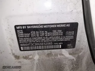 2016 BMW X1 xDrive28i with VIN WBXHT3C30G5E52065, listed as a IAAI auction lot 41552781 with 205,961 mi miles. Bid and sale history available at carsss.com. Image 9.