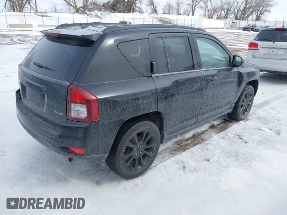 2014 Jeep Compass Sport with VIN 1C4NJCBA0ED680136, listed as a IAAI auction lot 41620604 with Not Provided miles. Bid and sale history available at carsss.com. Image 4.