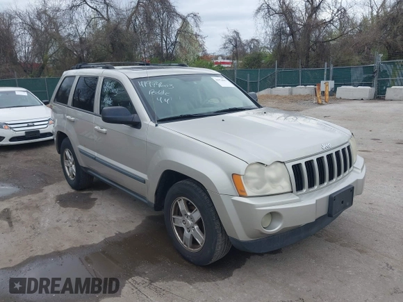 2007 Jeep Grand Cherokee Laredo z VIN 1J8HR48P77C548578, wystawiony jako IAAI lot #41974603 z przebiegiem 179 280 mil mil oraz . Historia ofert i sprzedaży dostępna na DreamBid. Obrazek 1.