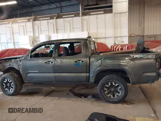 2016 Toyota Tacoma SR with VIN 3TMCZ5AN2GM041649, listed as a IAAI auction lot 41758859 with 139,558 mi miles and . Bid and sale history available at DreamBid. Image 15.