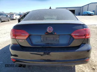 2014 Volkswagen Jetta GLI Edition 30 z VIN 3VW4S7AJ4EM325666, wystawiony jako Copart lot #47444345 z przebiegiem 182 665 mil mil oraz Szkoda całkowita • Salvage title. Historia ofert i sprzedaży dostępna na DreamBid. Obrazek 6.