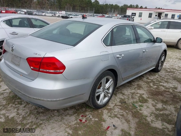 2015 Volkswagen Passat 1.8T SE w/Sunroof & Nav with VIN 1VWBT7A38FC019255, listed as a IAAI auction lot 41872887 with 121,845 mi miles. Bid and sale history available at carsss.com. Image 4.