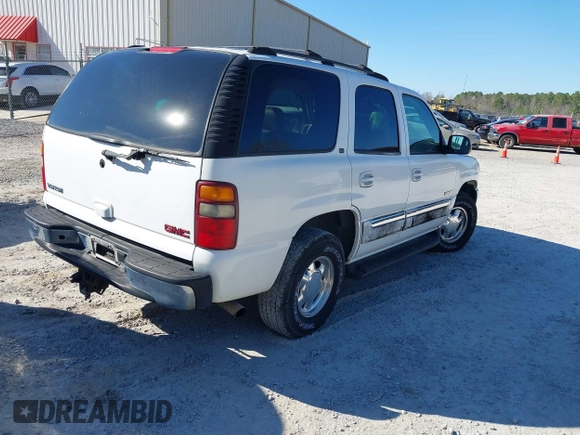 2003 GMC Yukon SLT with VIN 1GKEC13Z83R143232, listed as a IAAI auction lot 41655509 with 148,574 mi miles. Bid and sale history available at carsss.com. Image 4.