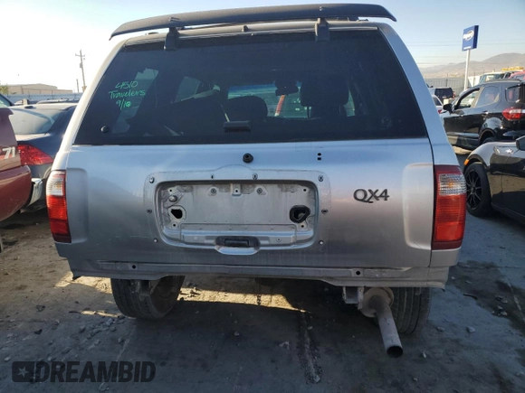 2002 Infiniti QX4 Luxury z VIN JNRDR09Y82W261103, wystawiony jako Copart lot #72452414 z przebiegiem 256 625 mil mil oraz Szkoda całkowita • Salvage title. Historia ofert i sprzedaży dostępna na DreamBid. Obrazek 6.