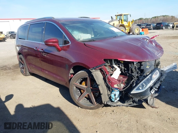 2021 Chrysler Pacifica Touring L z VIN 2C4RC1BG9MR588605, wystawiony jako IAAI lot #41830744 z przebiegiem 106 937 mil mil oraz . Historia ofert i sprzedaży dostępna na DreamBid. Obrazek 1.