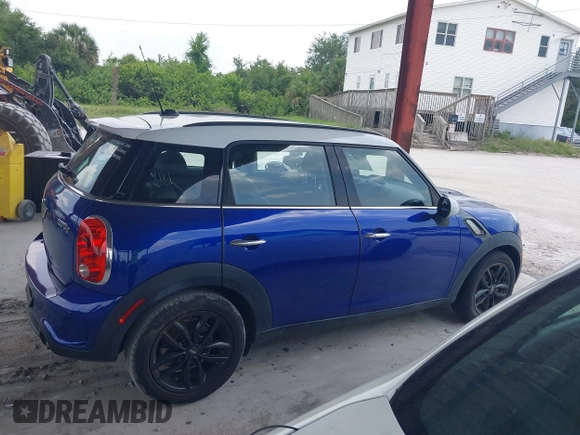 2016 MINI Countryman S with VIN WMWZC3C50GWT08698, listed as a IAAI auction lot 42493302 with 61,306 mi miles and . Bid and sale history available at DreamBid. Image 13.