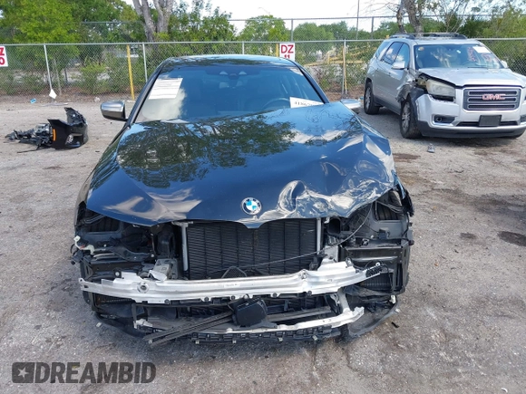 2019 BMW 5 Series M550i xDrive with VIN WBAJB9C51KB289355, listed as a IAAI auction lot 41867984 with 30,106 mi miles and . Bid and sale history available at DreamBid. Image 12.