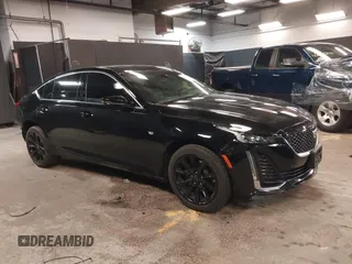 2023 Cadillac CT5 Luxury z VIN 1G6DX5RK7P0135813, wystawiony jako IAAI lot #42130722 z przebiegiem 20 738 mil mil oraz . Historia ofert i sprzedaży dostępna na DreamBid. Obrazek 1.