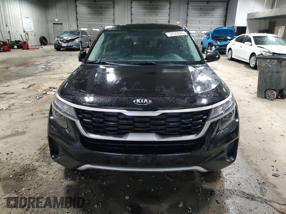 2021 Kia Seltos LX with VIN KNDEPCAA0M7144901, listed as a Copart auction lot 57679045 with 100,685 mi miles and Salvage title. Bid and sale history available at DreamBid. Image 5.
