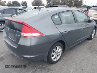 2011 Honda Insight EX z VIN JHMZE2H72BS001792, wystawiony jako IAAI lot #42207415 z przebiegiem 131 792 mil mil oraz . Historia ofert i sprzedaży dostępna na DreamBid. Obrazek 4.