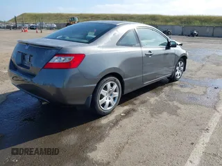 2009 Honda Civic Cpe LX with VIN 2HGFG12699H540664, listed as a IAAI auction lot 42100966 with Not Provided miles. Bid and sale history available at carsss.com. Image 4.
