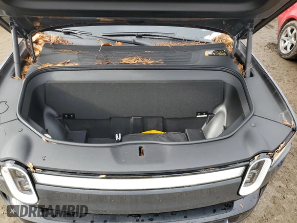 2023 Rivian R1S Adventure with VIN 7PDSGBBA5PN021048, listed as a Copart auction lot 44407815 with 10,642 mi miles and Salvage Title. Bid and sale history available at carsss.com. Image 12.
