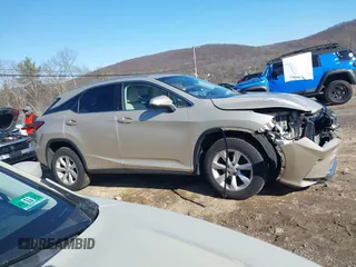 2016 Lexus RX 450h z VIN 2T2BGMCA7GC007006, wystawiony jako IAAI lot #41999343 z przebiegiem 124 912 mil mil oraz . Historia ofert i sprzedaży dostępna na DreamBid. Obrazek 13.