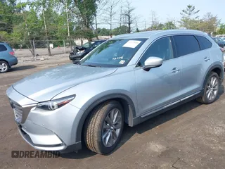 2020 Mazda CX-9 Grand Touring with VIN JM3TCBDY6L0424584, listed as a IAAI auction lot 42473920 with 32,385 mi miles and . Bid and sale history available at DreamBid. Image 17.