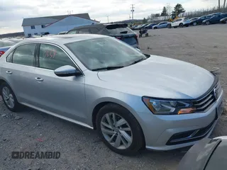 2018 Volkswagen Passat SE z VIN 1VWBA7A33JC052324, wystawiony jako IAAI lot #41880559 z przebiegiem 97 379 mil mil oraz . Historia ofert i sprzedaży dostępna na DreamBid. Obrazek 1.