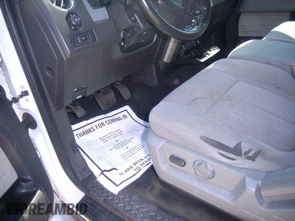 2014 Ford F-150 XL with VIN 1FTFX1EF2EKE57980, listed as a IAAI auction lot 42262657 with 283,114 mi miles and . Bid and sale history available at DreamBid. Image 1.