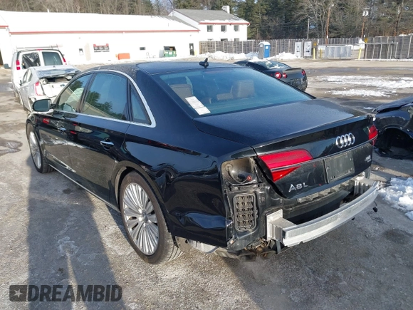 2015 Audi A8 L 4.0T with VIN WAU32AFD0FN035282, listed as a IAAI auction lot 41515136 with 76,518 mi miles. Bid and sale history available at carsss.com. Image 14.