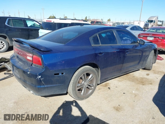 2014 Dodge Charger SXT with VIN 2C3CDXJGXEH255123, listed as a IAAI auction lot 41679977 with 153,032 mi miles. Bid and sale history available at carsss.com. Image 4.