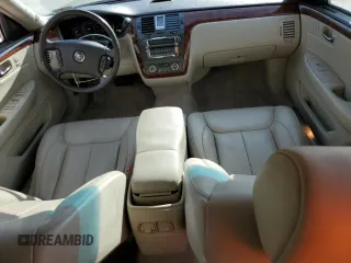 2007 Cadillac DTS Luxury I z VIN 1G6KD57Y57U120596, wystawiony jako Copart lot #55058175 z przebiegiem 119 593 mil mil oraz Szkoda całkowita • Salvage title. Historia ofert i sprzedaży dostępna na DreamBid. Obrazek 8.