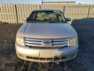 2009 Ford Taurus SEL with VIN 1FAHP24W79G103208, listed as a Copart auction lot 77621914 with 231,659 mi miles and Salvage Title. Bid and sale history available at carsss.com. Image 5.
