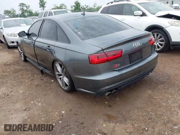 2016 Audi S6 Prestige z VIN WAUH2AFC1GN016187, wystawiony jako IAAI lot #42274744 z przebiegiem 169 821 mil mil oraz . Historia ofert i sprzedaży dostępna na DreamBid. Obrazek 3.