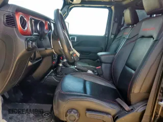 2020 Jeep Wrangler Unlimited Rubicon with VIN 1C4HJXFG5LW107933, listed as a Copart auction lot 62012515 with 60,115 mi miles and Salvage title. Bid and sale history available at DreamBid. Image 7.