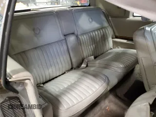 1984 Cadillac Eldorado z VIN 1G6AL5785EE630873, wystawiony jako Copart lot #82896404 z przebiegiem 3 839 mil mil oraz Czysty tytuł • Clean title. Historia ofert i sprzedaży dostępna na DreamBid. Obrazek 10.