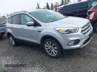 2017 Ford Escape Titanium with VIN 1FMCU9J97HUE98023, listed as a IAAI auction lot 41745843 with 24,857 mi miles. Bid and sale history available at carsss.com. Image 1.