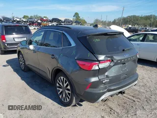 2020 Ford Escape Titanium with VIN 1FMCU9J9XLUA66440, listed as a IAAI auction lot 41464049 with 57,626 mi miles and . Bid and sale history available at DreamBid. Image 3.