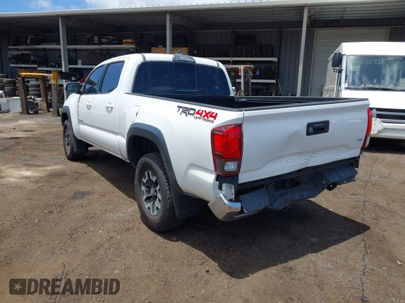 2018 Toyota Tacoma SR5 with VIN 3TMDZ5BN5JM048038, listed as a IAAI auction lot 42084922 with 79,718 mi miles and . Bid and sale history available at DreamBid. Image 6.