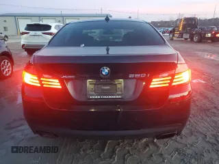 2016 BMW 5 Series 550i xDrive with VIN WBAKP9C52GD981190, listed as a Copart auction lot 85248244 with 90,962 mi miles and Salvage title. Bid and sale history available at DreamBid. Image 6.