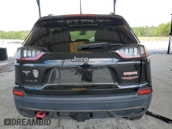 2019 Jeep Cherokee Trailhawk with VIN 1C4PJMBN7KD374676, listed as a Copart auction lot 51504125 with 34,323 mi miles and Salvage Title. Bid and sale history available at DreamBid. Image 6.