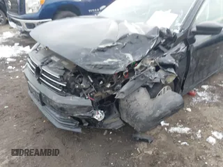 2015 Volkswagen Jetta S z VIN 3VW1K7AJ0FM353565, wystawiony jako IAAI lot #41402448 z przebiegiem 112 728 mil mil oraz . Historia ofert i sprzedaży dostępna na DreamBid. Obrazek 6.