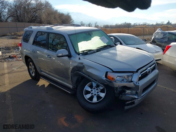 2012 Toyota 4Runner SR5 with VIN JTEBU5JR6C5102512, listed as a IAAI auction lot 41291233 with 164,476 mi miles. Bid and sale history available at carsss.com. Image 1.
