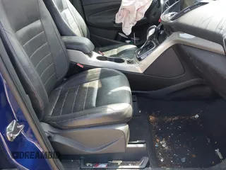 2013 Ford Escape SEL with VIN 1FMCU0H94DUC84666, listed as a IAAI auction lot 42001644 with 165,269 mi miles. Bid and sale history available at carsss.com. Image 5.