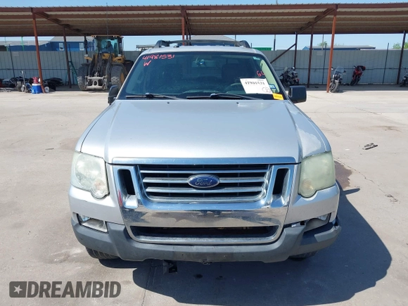 2010 Ford Explorer Sport Trac XLT z VIN 1FMEU3BE2AUA00236, wystawiony jako IAAI lot #41981531 z przebiegiem 101 993 mil mil oraz . Historia ofert i sprzedaży dostępna na DreamBid. Obrazek 13.
