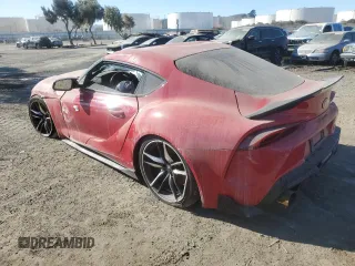 2022 Toyota GR Supra 3.0 with VIN WZ1DB0C04NW046282, listed as a Copart auction lot 80995874 with 32,087 mi miles and Salvage Title. Bid and sale history available at carsss.com. Image 2.